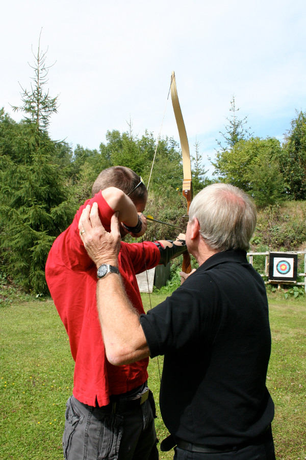 Barebow recurve archery equipment and covered range